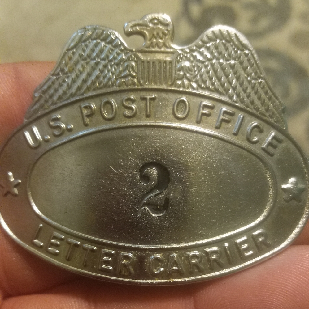 Letter carrier badge.